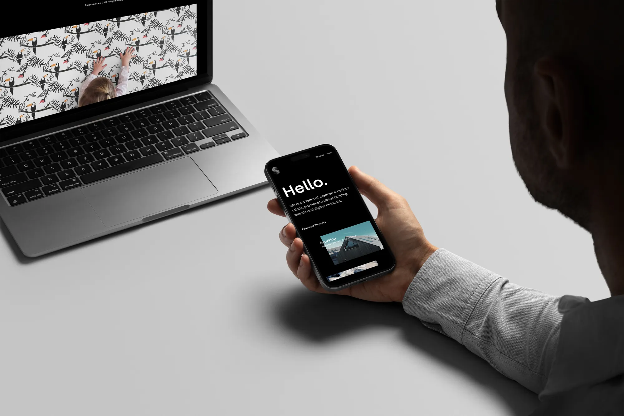 The Ström portfolio website displayed on a laptop and a phone